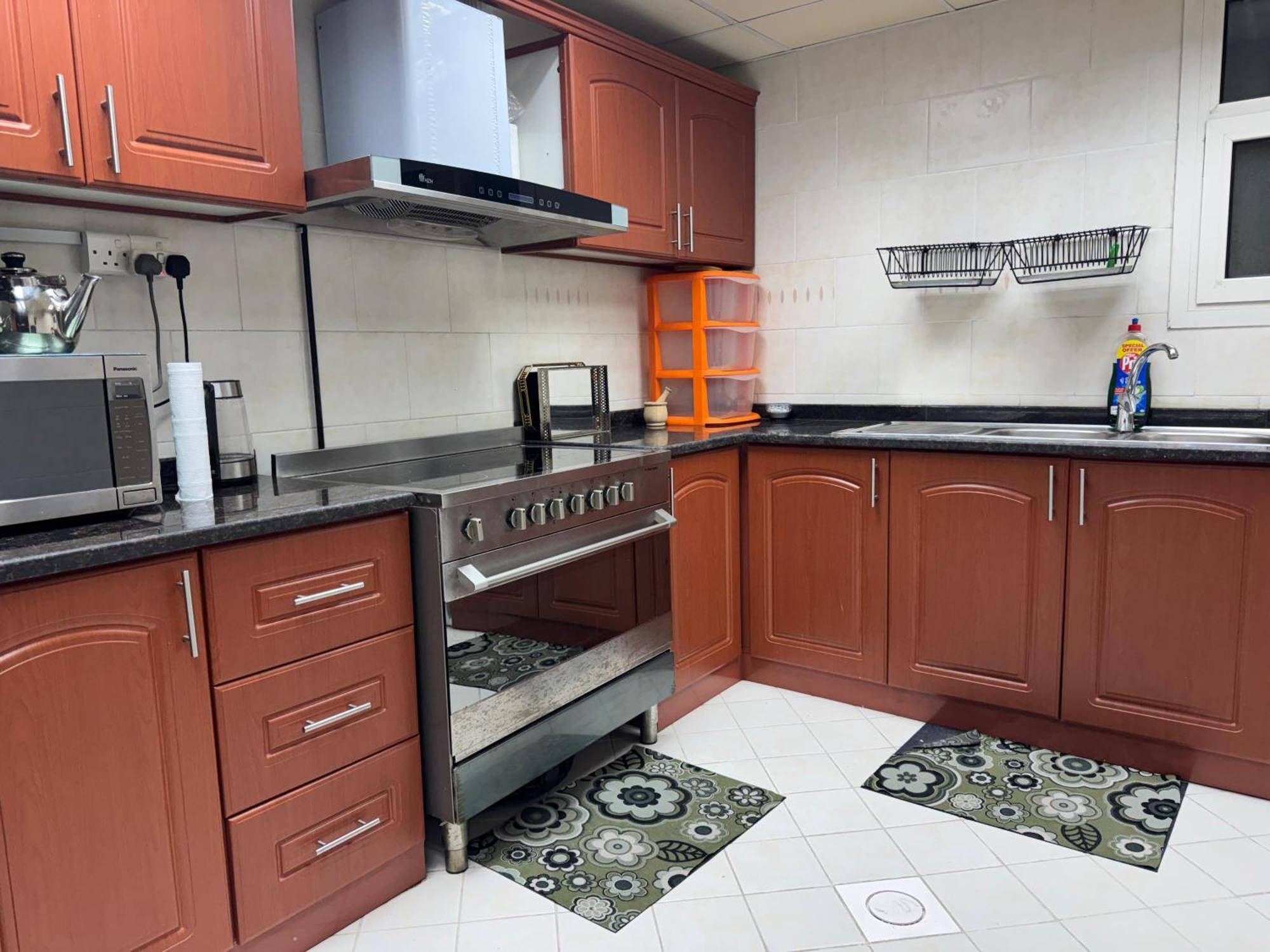 The Family Spot Appartement Sharjah Buitenkant foto